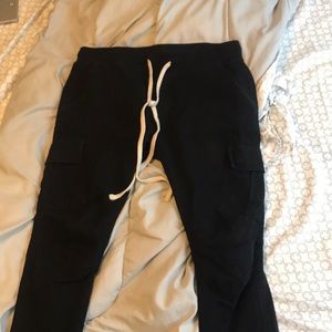 Black string skinny cargo pants
